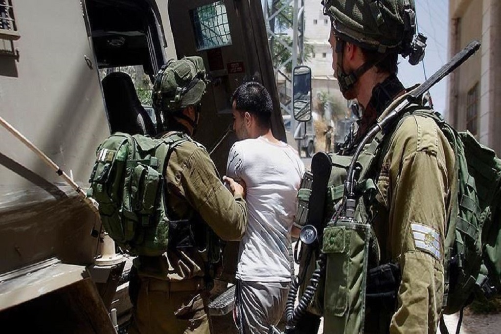 IOF kidnaps young man, mother of two prisoners in W. Bank