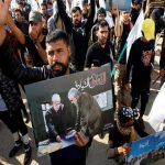 Iraqis Rally Ahead of Anniv. of US Assassination of Gen. Soleimani, Burn Model of American Embassy