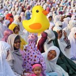 Muslims celebrate Eid al-Fitr around the world