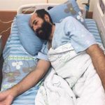 Israeli forces deny hunger-striking Palestinian inmate’s wife from visiting her husband