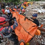 Several school children among 252 dead in Indonesia quake