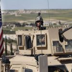 Washington’s aims by claiming American soldiers under attack in Syria