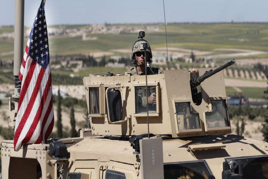 Washington’s aims by claiming American soldiers under attack in Syria